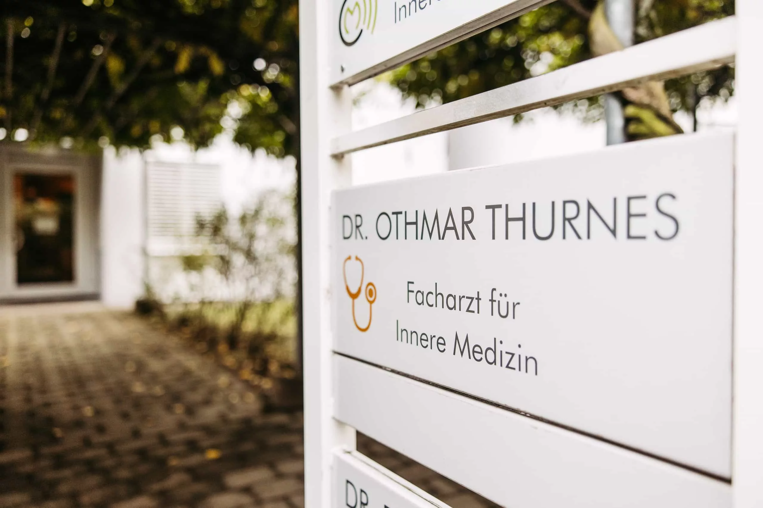 Schild Eingang Praxis